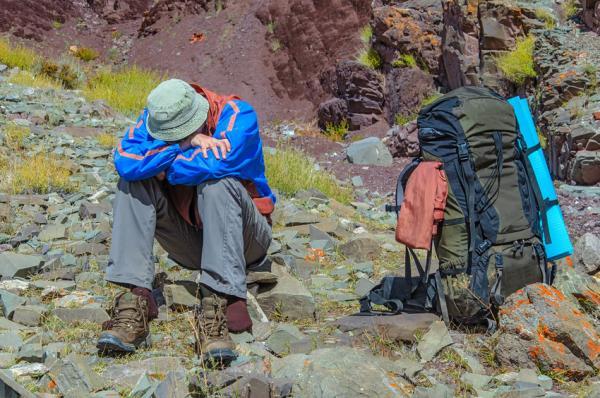 Trekker resting in height mountain India